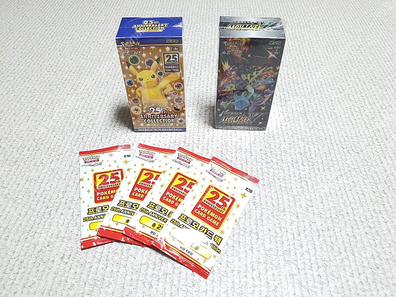 포켓몬 카드 25주년 확장팩 1박스 + 프로모션 4팩 팝니다.